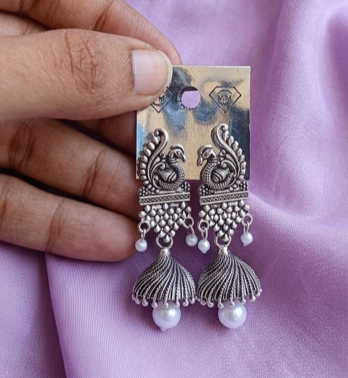 Peacock Motif Oxidized Silver Jhumkas with Pearl Drops